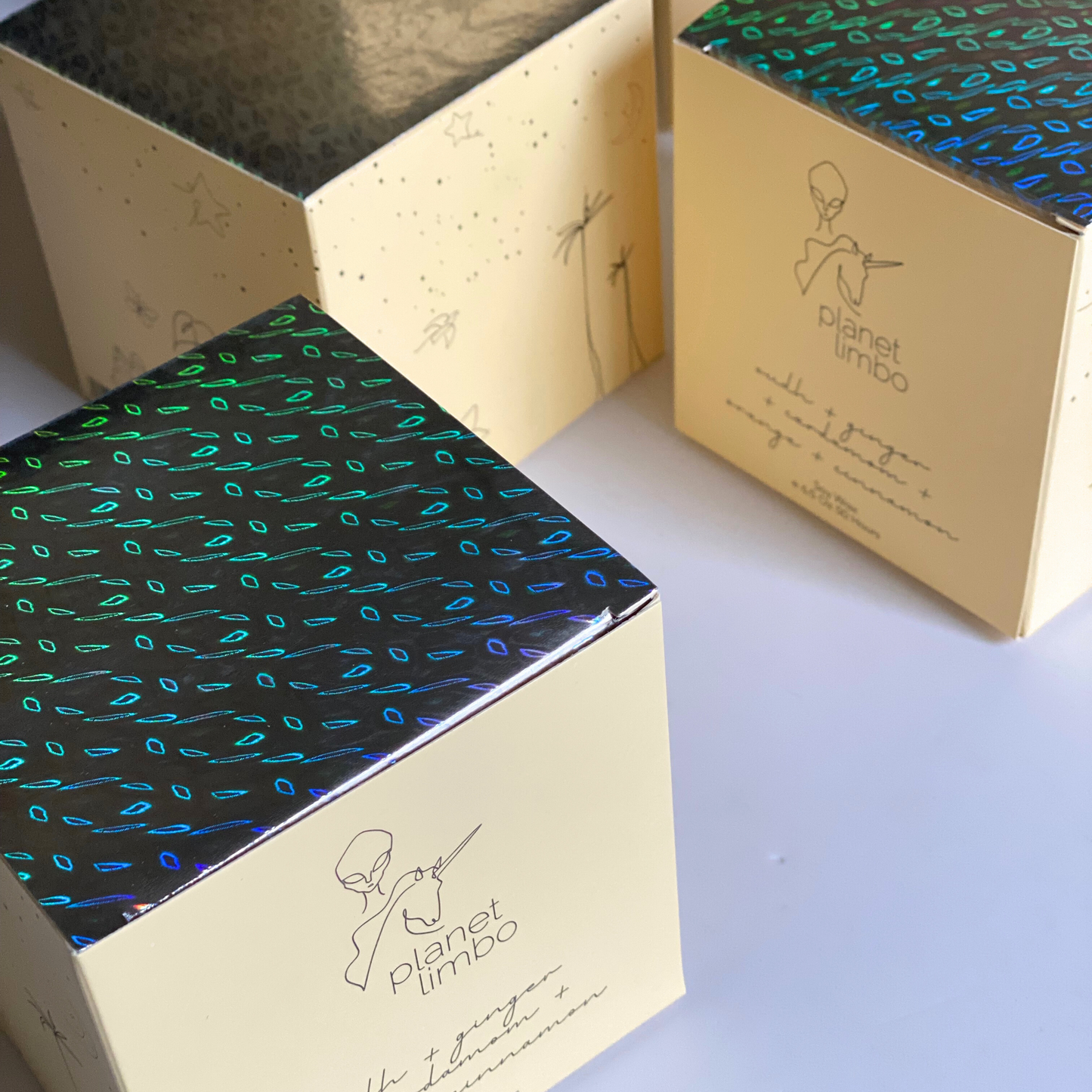 'oudh + ginger + cardamom + orange + cinnamon' soy candle