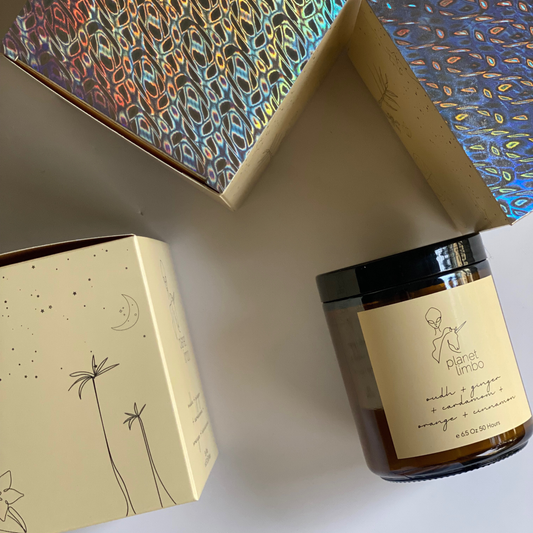 'oudh + ginger + cardamom + orange + cinnamon' soy candle